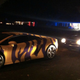 Illustration for article titled This LSU-Striped Lamborghini Was Pulled Over For Breaking Laws Of Good Taste